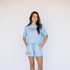 The Kristen Airy Tee War Eagle Woven Label | Light Blue