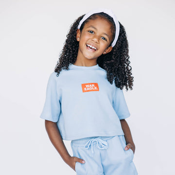 The Kristen Airy Tee War Eagle Woven Label | Youth Light Blue