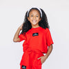 The Kristen Airy Tee Go Dawgs Woven Label | Youth Bright Red