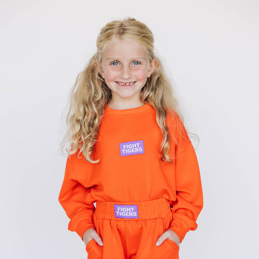 The Ava Airy Crewneck Fight Tigers Woven Label | Youth Orange
