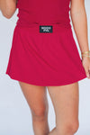 The Alli Tennis Skort Woo Pig Woven Label | Crimson