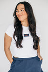 The Raegan Ribbed Baby Tee War Eagle Woven Label | White