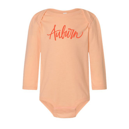 The Auburn Script | Baby Peachy Long Sleeve Onesie