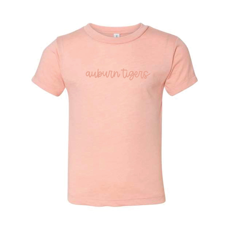 The Auburn Tigers Cursive | Toddler Peach Triblend Tee