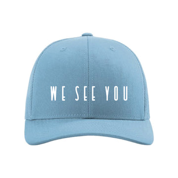 The We See You Logo | Columbia Blue Trucker Cap