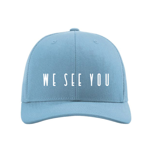 The We See You Logo | Columbia Blue Trucker Cap