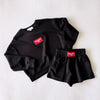 The Ava Airy Crewneck Wolves Up Woven Label | Black