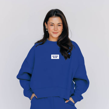 The Becca Boxy Crewneck Go Big Blue Woven Label | Royal