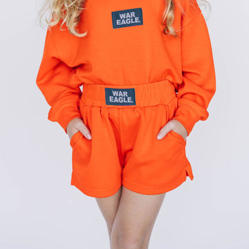 The Ava Airy Shorts War Eagle Woven Label | Youth Orange