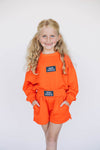 The Ava Airy Crewneck War Eagle Woven Label | Youth Orange